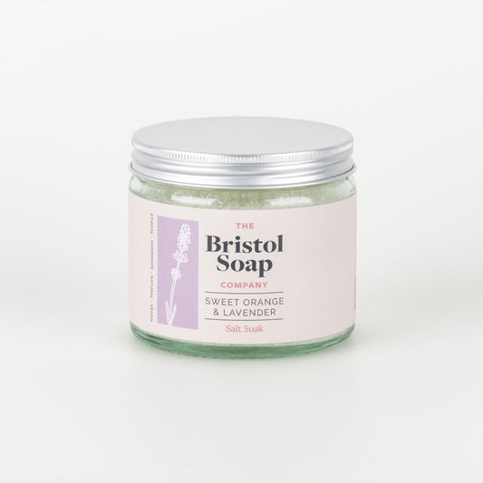 Jar of salt soak from The Bristol Soap Company with a silver lid on a white background